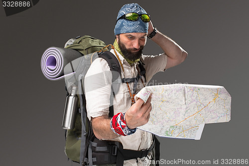 Image of Portrait of a male fully equipped tourist 