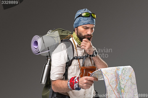 Image of Portrait of a male fully equipped tourist 