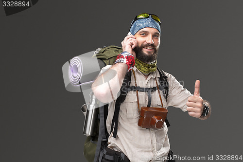 Image of Portrait of a male fully equipped tourist 