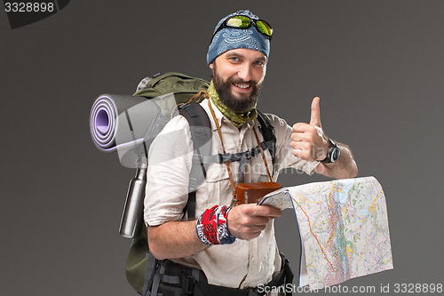 Image of Portrait of a male fully equipped tourist 