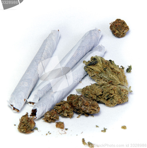 Image of three joints and pot buds