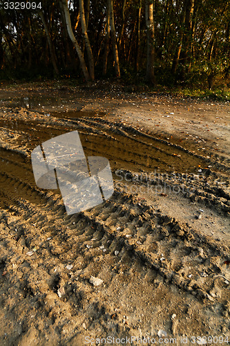 Image of Dirty broken rural road 