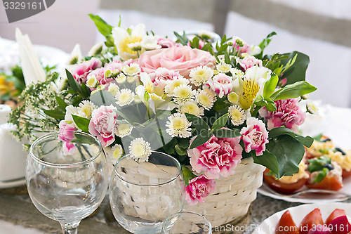 Image of Festive bouquet of flowers on the table