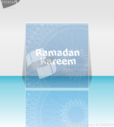 Image of Arabic Islamic calligraphy of text Ramadan Kareem on abstract background