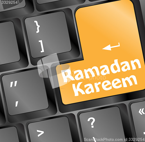 Image of Computer keyboard with ramadan kareem word on it