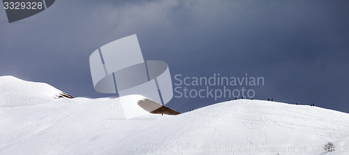 Image of Panoramic view on off piste slope and overcast sky