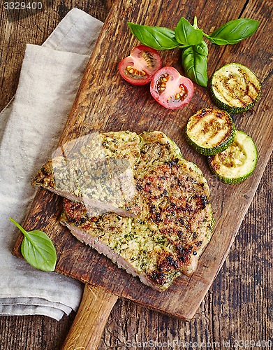 Image of grilled meat on cutting board