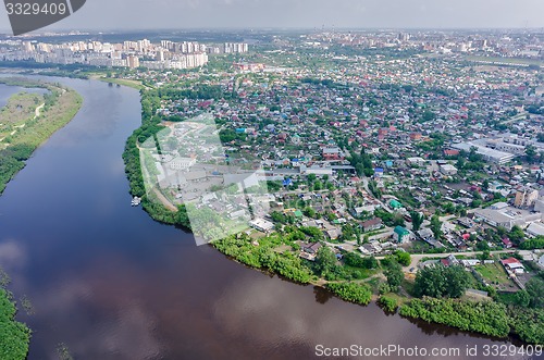 Image of Disrict of private houses on bank of river. Tyumen