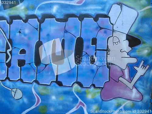 Image of blue graffiti and tags