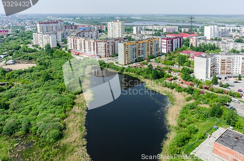 Image of Residential district and Gipsy lake. Tyumen.Russia