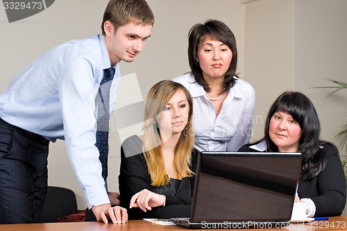 Image of Businessgroup with laptop