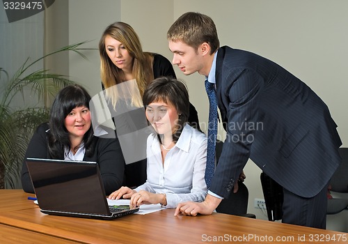 Image of Businessgroup with laptop