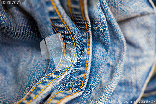 Image of vintage Jeans with yellow stitching thread