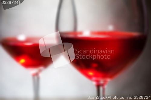 Image of red wine in two goblets