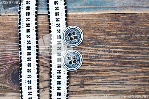 Image of Vintage ribbons with embroidered pattern and ancient classical b