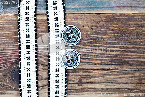 Image of Vintage ribbons with embroidered pattern and ancient classical b