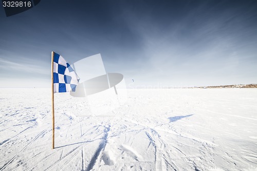 Image of Flags on the background of winter sky