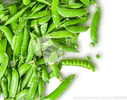 Image of The scattered pods of green peas