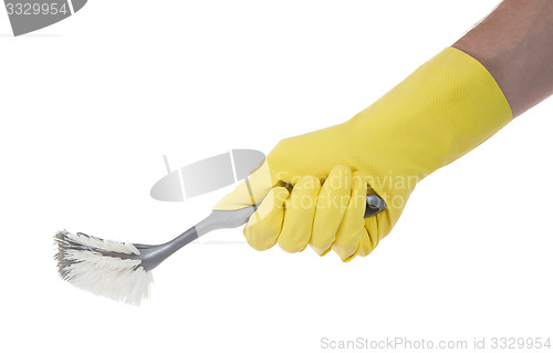 Image of Protection glove holding a dish-brush