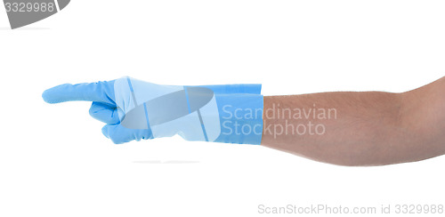 Image of Hand in an cleaning glove making a directional sign