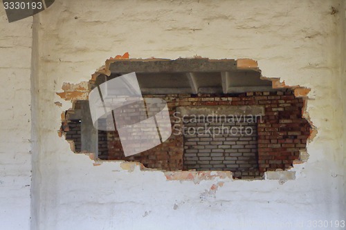 Image of hole in the wall