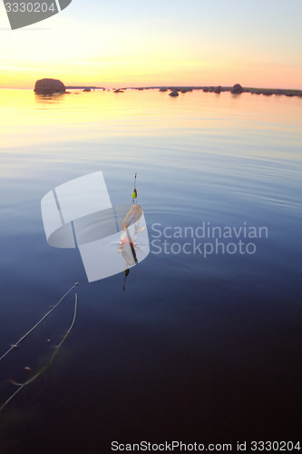 Image of Sunset river perch fishing with the boat and a rod