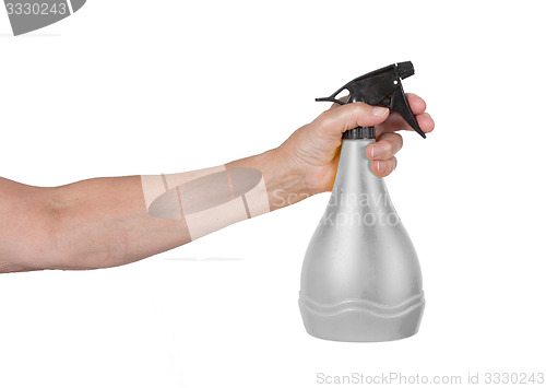 Image of Sprayer in the hand of an old woman