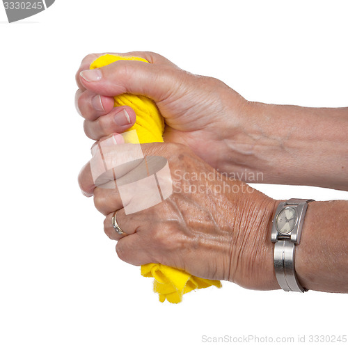 Image of Old woman cleaning