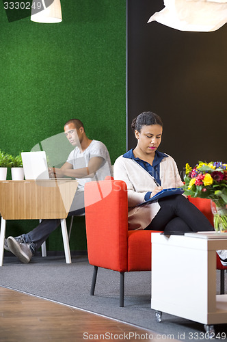 Image of Businesspeople Working At Lobby