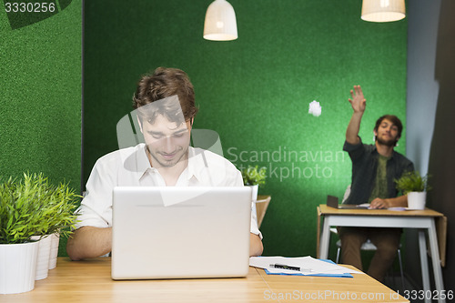 Image of Student Using Laptop In Stylish Lobby