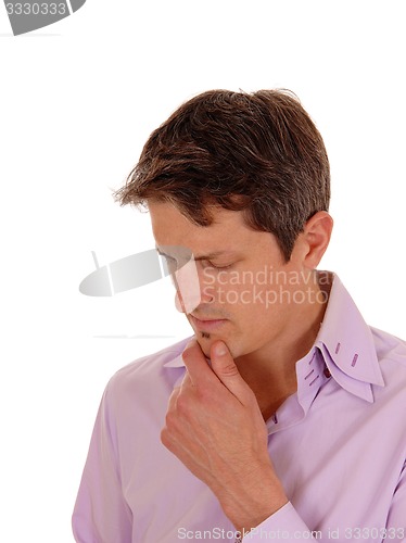 Image of Closeup of a thinking young man.