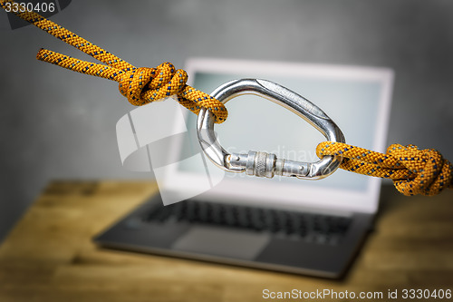 Image of carabiner with laptop