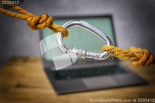 Image of carabiner with laptop