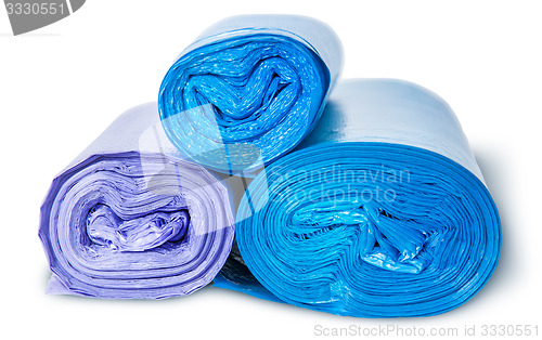 Image of Three rolls of plastic garbage bags top and front view