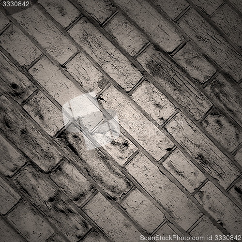 Image of in london abstract    texture of a ancien wall and ruined brick