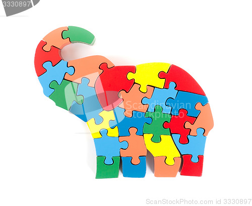 Image of Colorful puzzle pieces in elephant shape