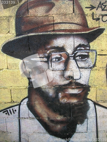 Image of graffiti - the black man with hat and glasses