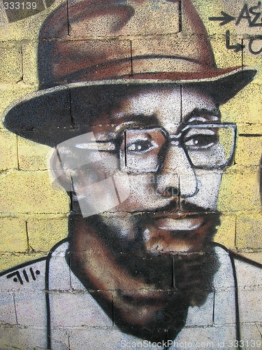 Image of graffiti - the black man with hat and glasses