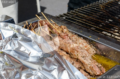Image of Juicy roasted kebabs on the grill