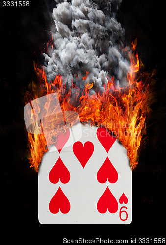 Image of Playing card with fire and smoke