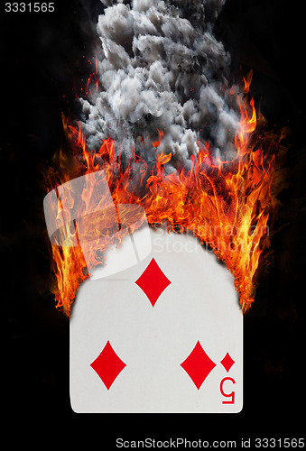 Image of Playing card with fire and smoke