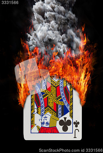 Image of Playing card with fire and smoke