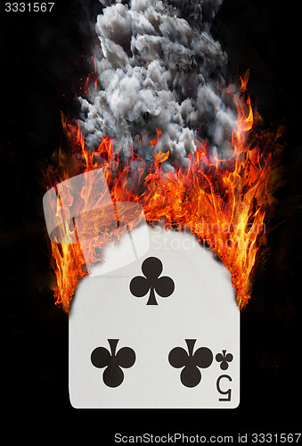 Image of Playing card with fire and smoke