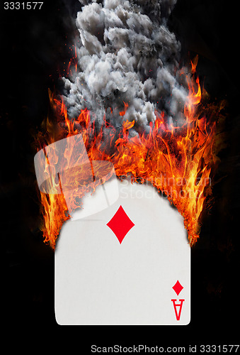 Image of Playing card with fire and smoke