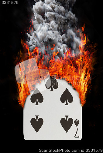 Image of Playing card with fire and smoke