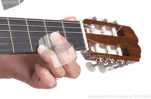 Image of Old hand and guitar isolated