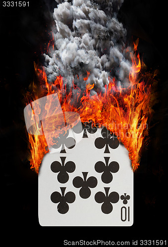 Image of Playing card with fire and smoke