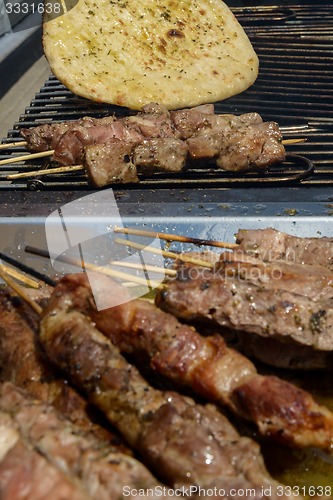 Image of Juicy roasted kebabs on the grill