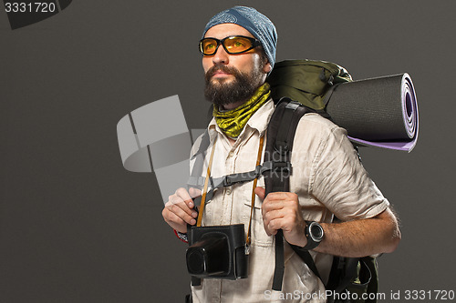 Image of Portrait of a male fully equipped tourist 