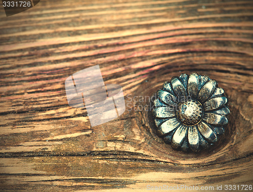 Image of vintage metallic button